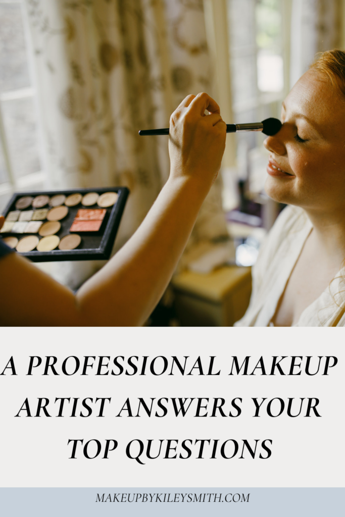 A professional makeup artist applies makeup to a clients face with a makeup brush
